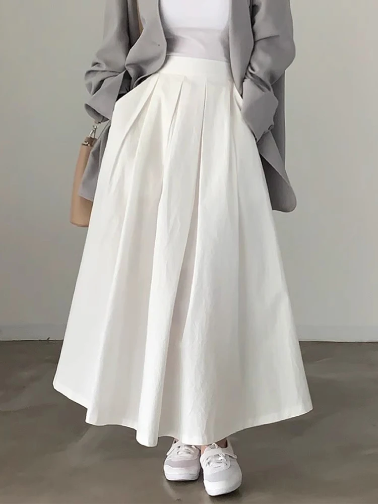 Шикарная юбка-миди трапециевидной формы с высокой талией, весенняя однотонная длинная юбка для похудения, женская корейская юбка, закрывающая бедра, длина
Шикарная юбка-миди трапециевидной формы с высокой талией, весенняя однотонная длинная юбка для похудения, женская корейская юбка, закрывающая бедра, длина