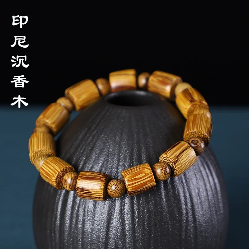 12mmIndonesian Black Sandalwood High-Density Blood Sandalwood Green Sandalwood Purple Sandalwood Barrel Bead Bracelet
12mmIndonesian Black Sandalwood High-Density Blood Sandalwood Green Sandalwood Purple Sandalwood Barrel Bead Bracelet