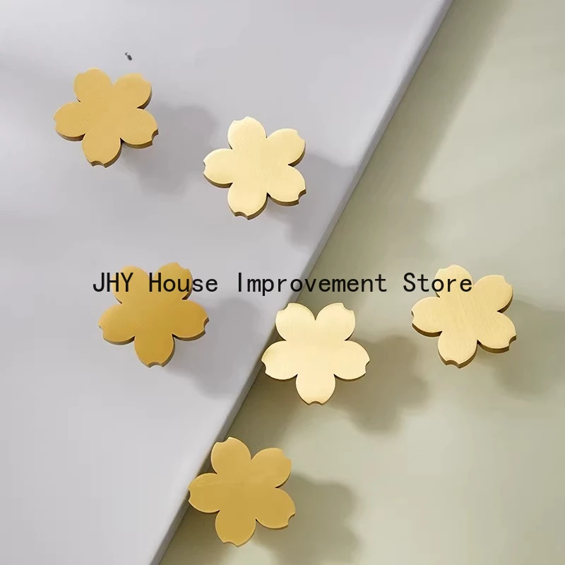 Сакура ручка латунная детская комната гардероб дверца шкафа ящик кухня современный простой золотой цветок с одним отверстием
Сакура ручка латунная детская комната гардероб дверца шкафа ящик кухня современный простой золотой цветок с одним отверстием