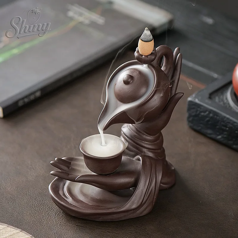 Purple Clay Hanging Pot Incense Stick Reflux Incense Burner Handicraft Ornament Buddha Hand Teapot Zen Ornament
Purple Clay Hanging Pot Incense Stick Reflux Incense Burner Handicraft Ornament Buddha Hand Teapot Zen Ornament