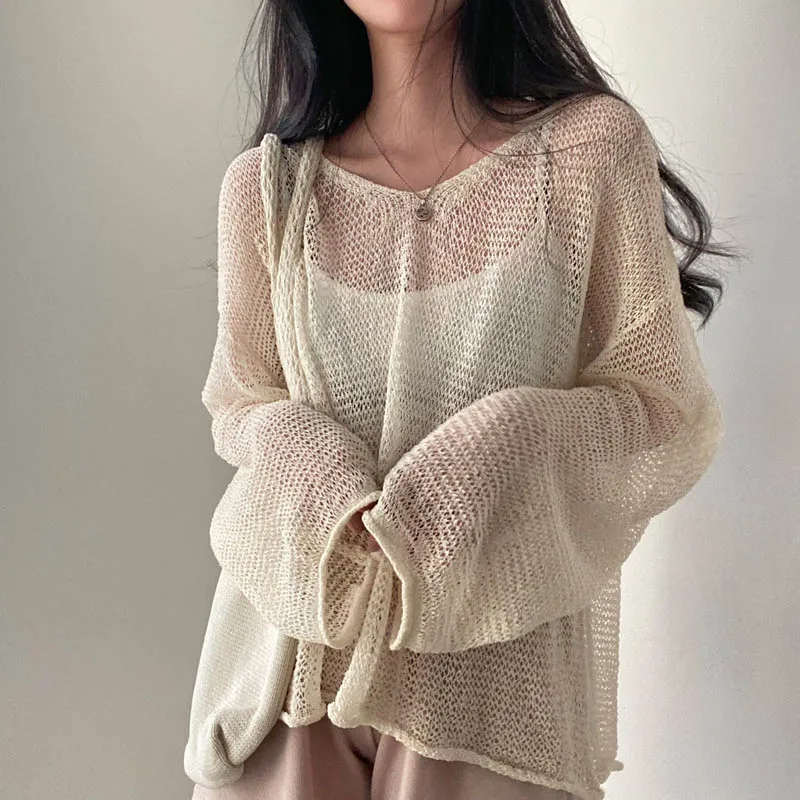 Spring Summer Chic Hollow Out Solid Color Knitted Long Sleeve Tops Women Clothing Elegant Loose V-neck Sunscreen Thin Sweaters
Spring Summer Chic Hollow Out Solid Color Knitted Long Sleeve Tops Women Clothing Elegant Loose V-neck Sunscreen Thin Sweaters