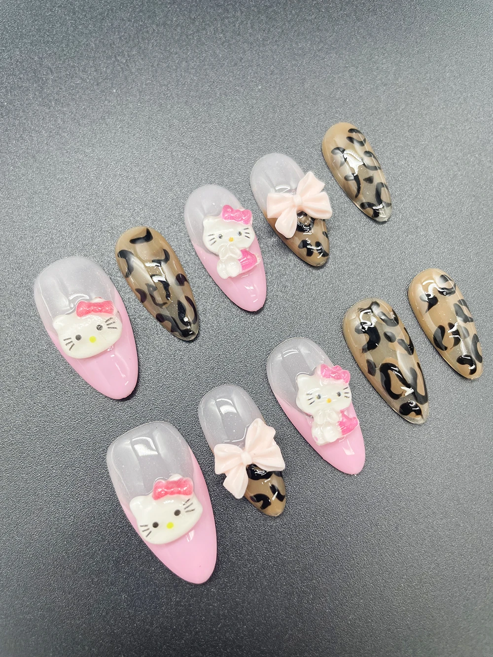 10Pcs Handmade Almond Hello Kitty False Nails Tips 2025 Winter New Style Leopard Print Bow Design Diy French Press On Nails
10Pcs Handmade Almond Hello Kitty False Nails Tips 2025 Winter New Style Leopard Print Bow Design Diy French Press On Nails