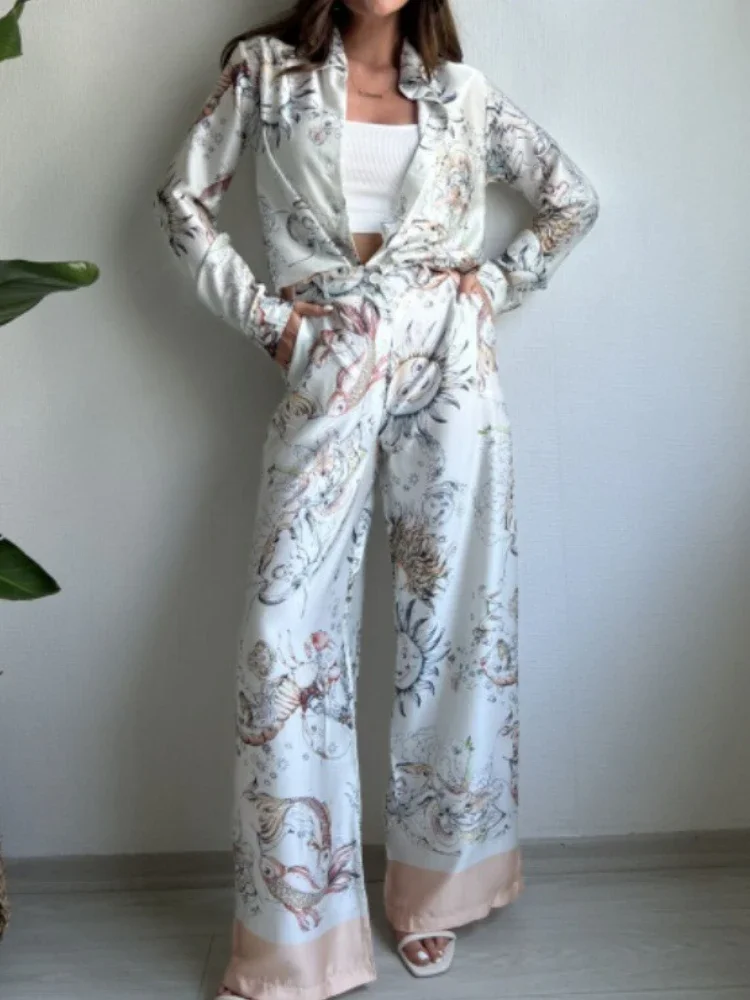 Комплект из 2 предметов для женщин, новинка лета 2025 года, элегантный принт, рубашка с длинными рукавами, топы, костюмы, модные повседневные свободные комплекты с широкими брюками
Комплект из 2 предметов для женщин, новинка лета 2025 года, элегантный принт, рубашка с длинными рукавами, топы, костюмы, модные повседневные свободные комплекты с широкими брюками