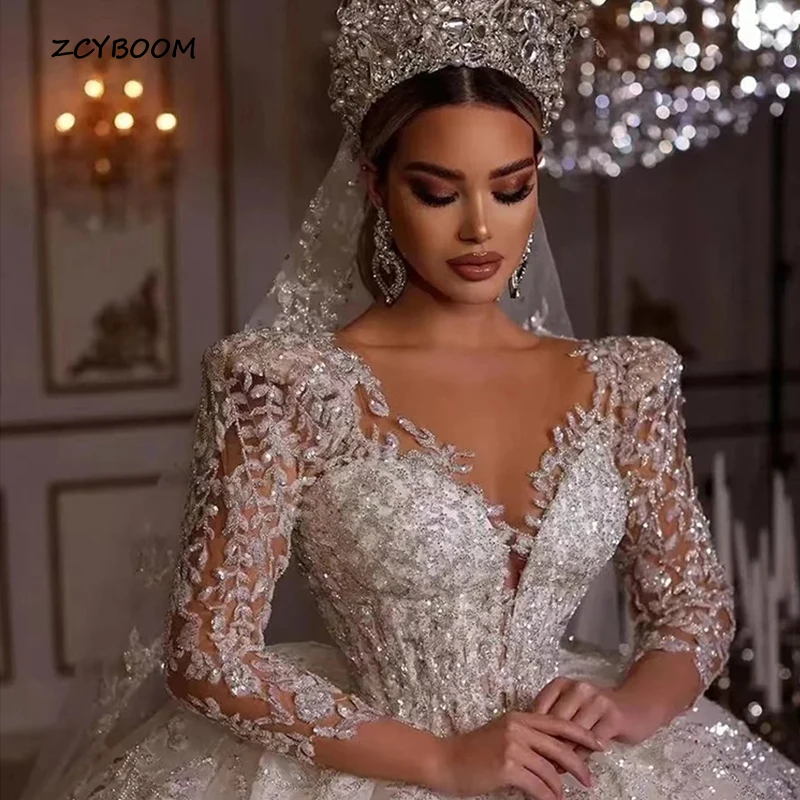 Customized Luxurious Muslim Sexy Long Sleeve Wedding Dresses Sparkly Appliques Exquisite Deep V-Neck Floor Length Bridal Ball Go
Customized Luxurious Muslim Sexy Long Sleeve Wedding Dresses Sparkly Appliques Exquisite Deep V-Neck Floor Length Bridal Ball Go