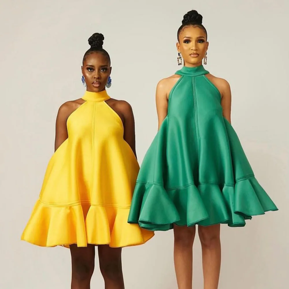 Elegant Yellow And Green Dresses With High Necklines And Flared Skirts Models Wear Bold Colors And Statement Earrings For A Chic
Elegant Yellow And Green Dresses With High Necklines And Flared Skirts Models Wear Bold Colors And Statement Earrings For A Chic