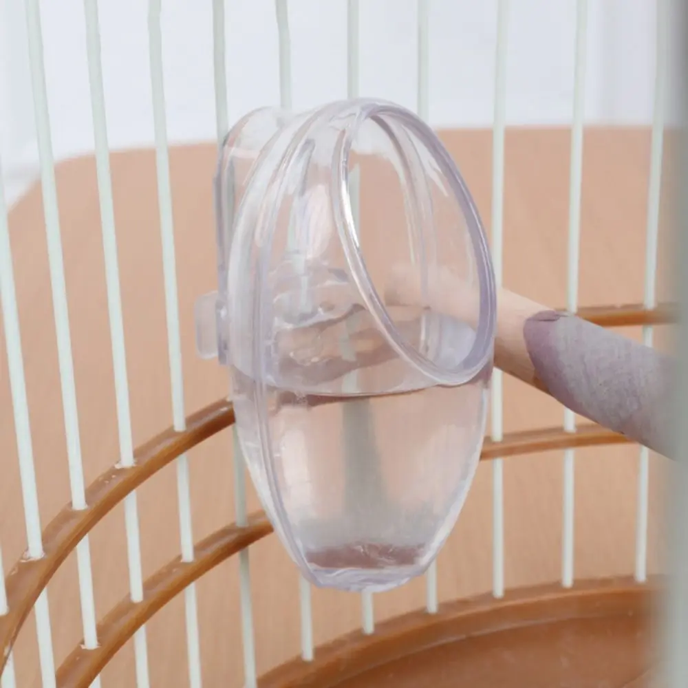 Wall Hanging Bird Food Cup Anti Splashing Detachable Bird Feeding Bowl Plastic Transparent Bird Food Dispenser For Cage
Wall Hanging Bird Food Cup Anti Splashing Detachable Bird Feeding Bowl Plastic Transparent Bird Food Dispenser For Cage