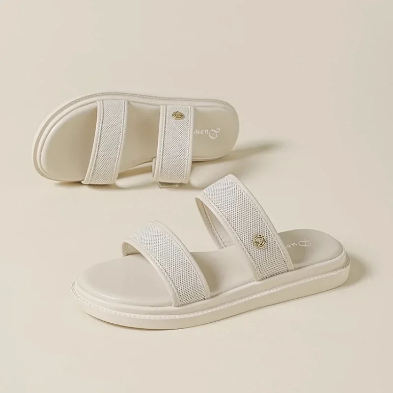 Thick Bottom One Word Summer 2025 New Beach Small Fragrant Style Outdoor Fashion Large Cool Slippers for Women
Thick Bottom One Word Summer 2025 New Beach Small Fragrant Style Outdoor Fashion Large Cool Slippers for Women