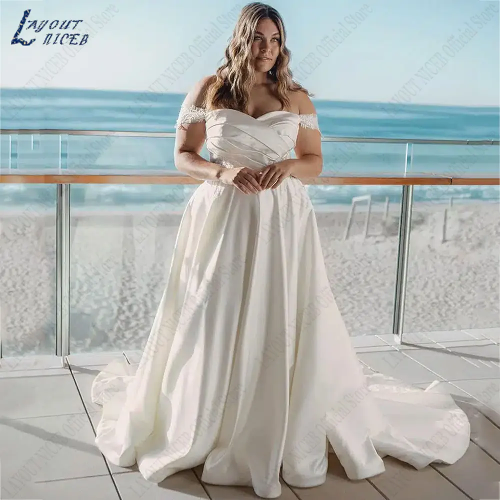 LAYOUT NICEB Appliques Sweetheart Neck Wedding Dresses Off Shoulder A-Line Satin Bride Gowns Plus Size Backless robes de mariée
LAYOUT NICEB Appliques Sweetheart Neck Wedding Dresses Off Shoulder A-Line Satin Bride Gowns Plus Size Backless robes de mariée