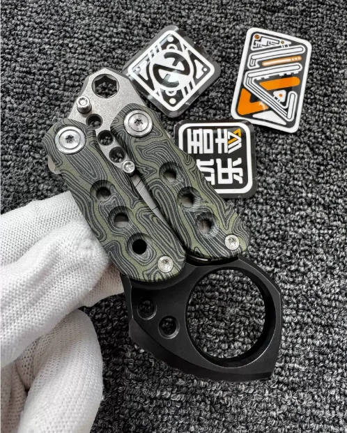 Used EDC Wan Wu Le Zhi TC21 Titanium ➕ G10 Bloodline Clan ➕ Titanium tail ring EDC metal decompression toy
Used EDC Wan Wu Le Zhi TC21 Titanium ➕ G10 Bloodline Clan ➕ Titanium tail ring EDC metal decompression toy