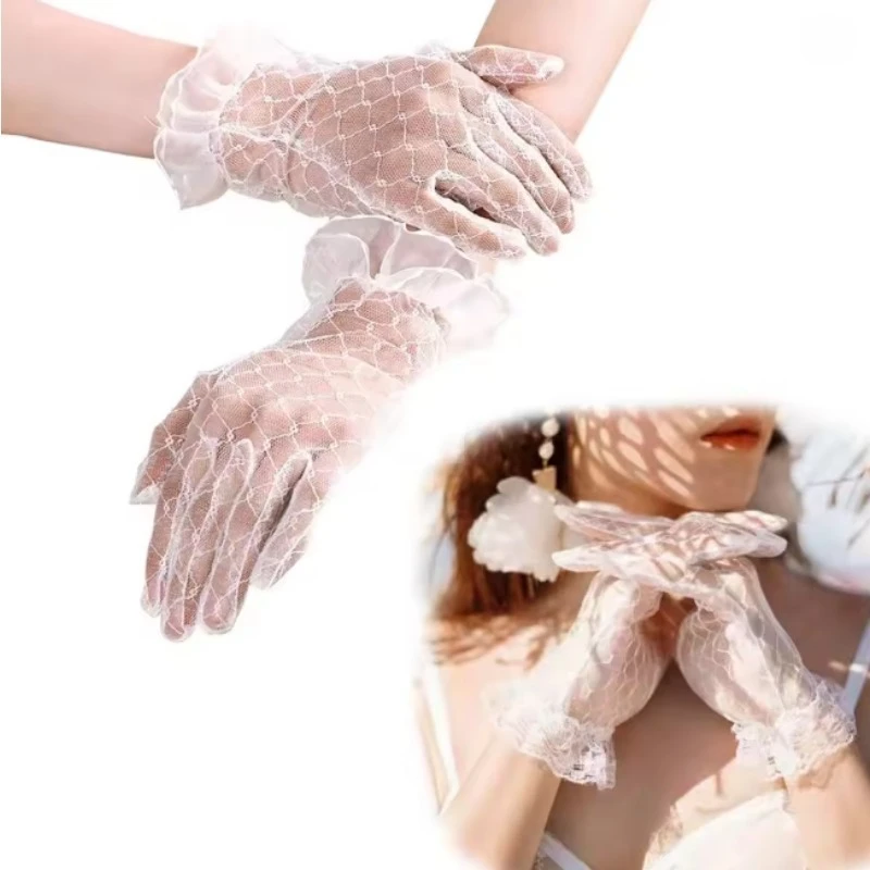 An Elegant Pair of Black Lace Gloves with White Floral Cutouts, Perfect for Evening Events and Bridal Cosplay Accessories.
An Elegant Pair of Black Lace Gloves with White Floral Cutouts, Perfect for Evening Events and Bridal Cosplay Accessories.