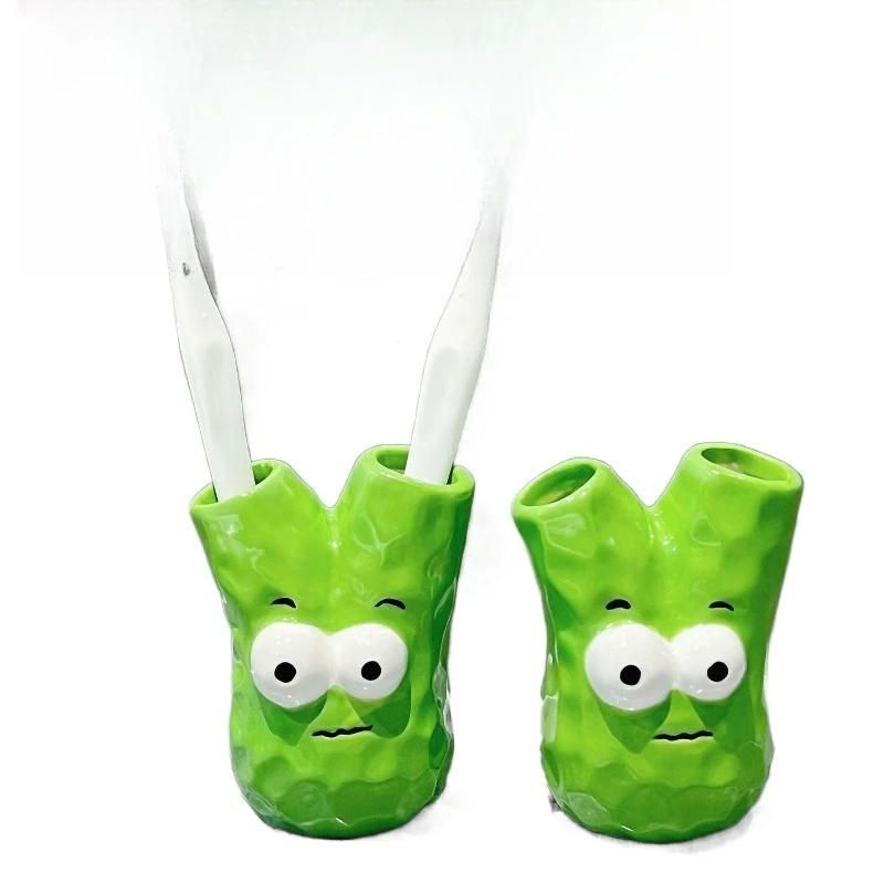 Creative ceramic toothbrush holder, one green onion to the end, cute creative free installation, drainable bathroom, absorption
Creative ceramic toothbrush holder, one green onion to the end, cute creative free installation, drainable bathroom, absorption