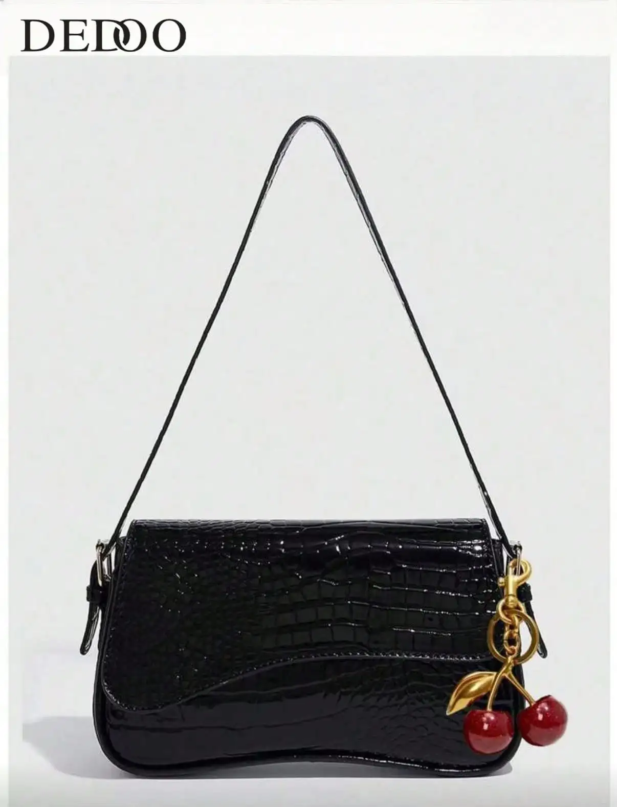 Black Patent Faux Leather Crossbody Bag with Croc Texture and Cherry Charm
Black Patent Faux Leather Crossbody Bag with Croc Texture and Cherry Charm