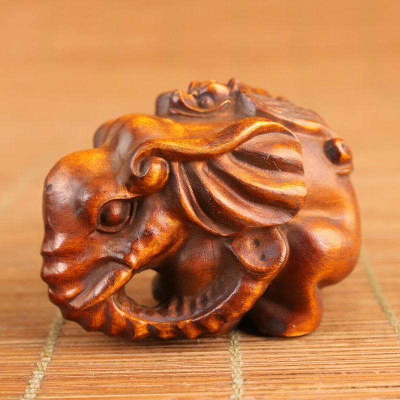 Chinese boxwood elephant fortune statue hand piece exquisite handicraft
Chinese boxwood elephant fortune statue hand piece exquisite handicraft