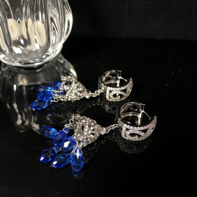 Stylish luxurious hollow design blue water drop tassel earrings diamond-encrusted stud earrings
Stylish luxurious hollow design blue water drop tassel earrings diamond-encrusted stud earrings