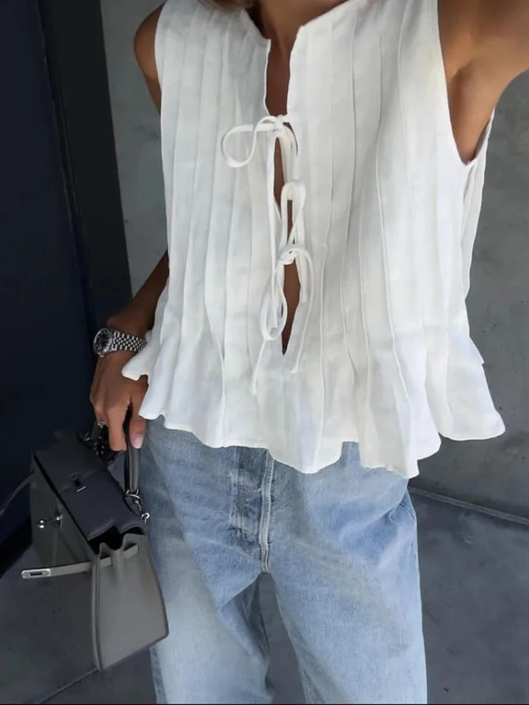 Fashion Bow Lace Up Shirts Women Cotton Linen Hollow Out Sleeveless Pleated Blouses Woman 2025 Summer New Casual Lady White Tops
Fashion Bow Lace Up Shirts Women Cotton Linen Hollow Out Sleeveless Pleated Blouses Woman 2025 Summer New Casual Lady White Tops