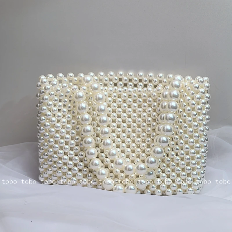 French Style Vintage Pearl Tote Bags for Women Niche Handmade Handbags for Women 2025 Designer Luxury Sweet Underarm Purses
French Style Vintage Pearl Tote Bags for Women Niche Handmade Handbags for Women 2025 Designer Luxury Sweet Underarm Purses