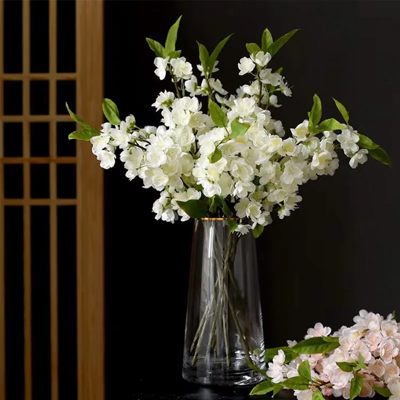 Simulation of peach blossoms with leaves wedding living room table decoration ornaments fake flower branches wholesale
Simulation of peach blossoms with leaves wedding living room table decoration ornaments fake flower branches wholesale