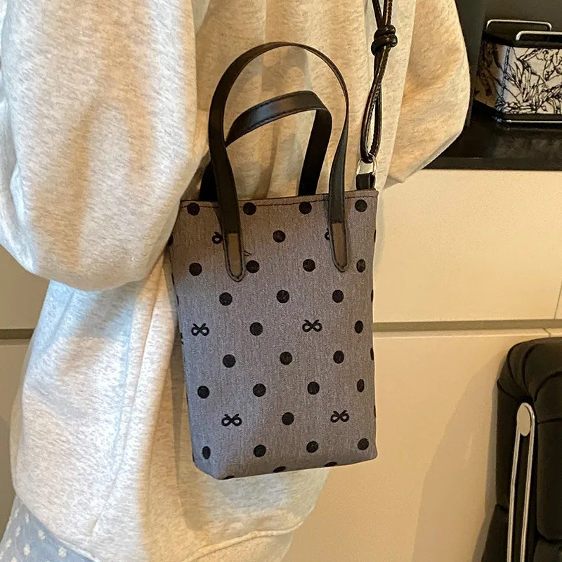 Fashion Trend Polka Dot Printing Small Tote Bag Shoulder Bag Canvas Bag Bow Printing Crossbody Bag Multipurpose Bag for Women
Fashion Trend Polka Dot Printing Small Tote Bag Shoulder Bag Canvas Bag Bow Printing Crossbody Bag Multipurpose Bag for Women