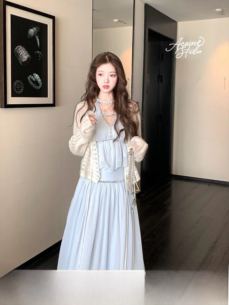 Blue ort V-Ne ter Vest High Waist Skirt Set Women's Faion Autumn Two-Piece Suit Metal Decoration Button Sle
Blue ort V-Ne ter Vest High Waist Skirt Set Women's Faion Autumn Two-Piece Suit Metal Decoration Button Sle