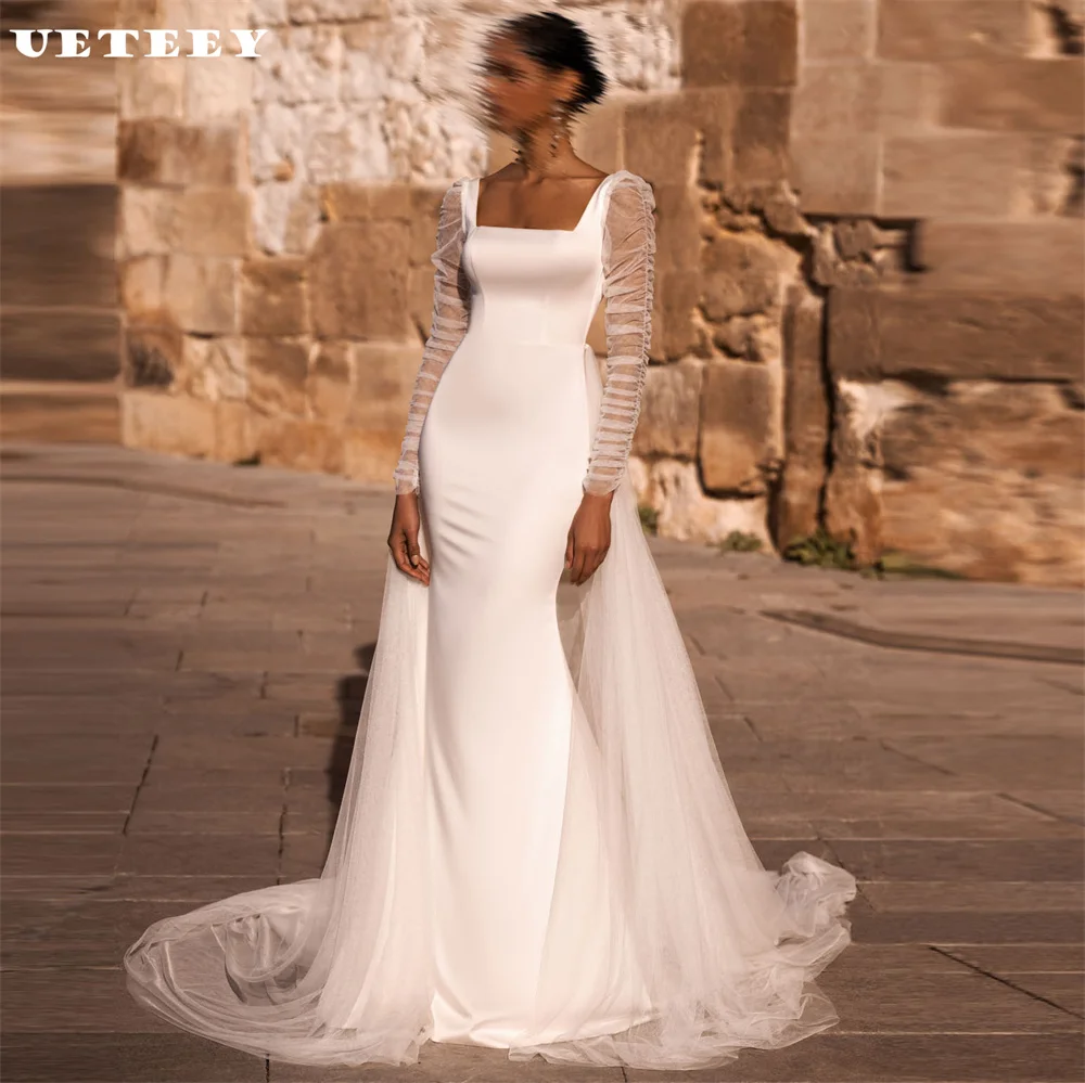 UETEEY Customized Simple Square Neck Long Sleeves Mermaid Wedding Dress Open Floor Length Detachable Court Train Bridal Gown
UETEEY Customized Simple Square Neck Long Sleeves Mermaid Wedding Dress Open Floor Length Detachable Court Train Bridal Gown