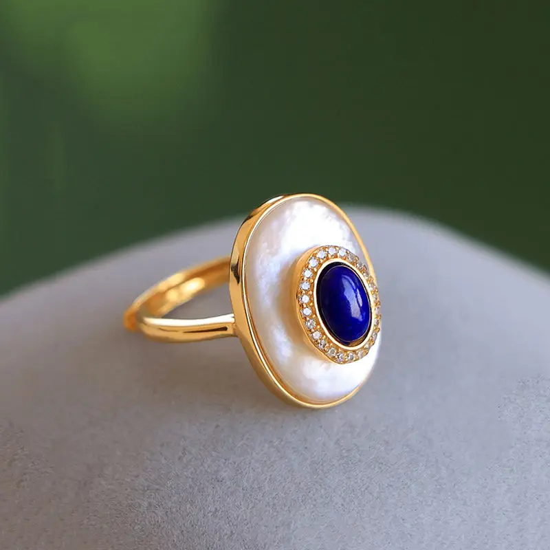 Vintage lapis lazuli engagement ring adjustable white fritillaria oval rings for women high-end classic Light luxury jewelry
Vintage lapis lazuli engagement ring adjustable white fritillaria oval rings for women high-end classic Light luxury jewelry