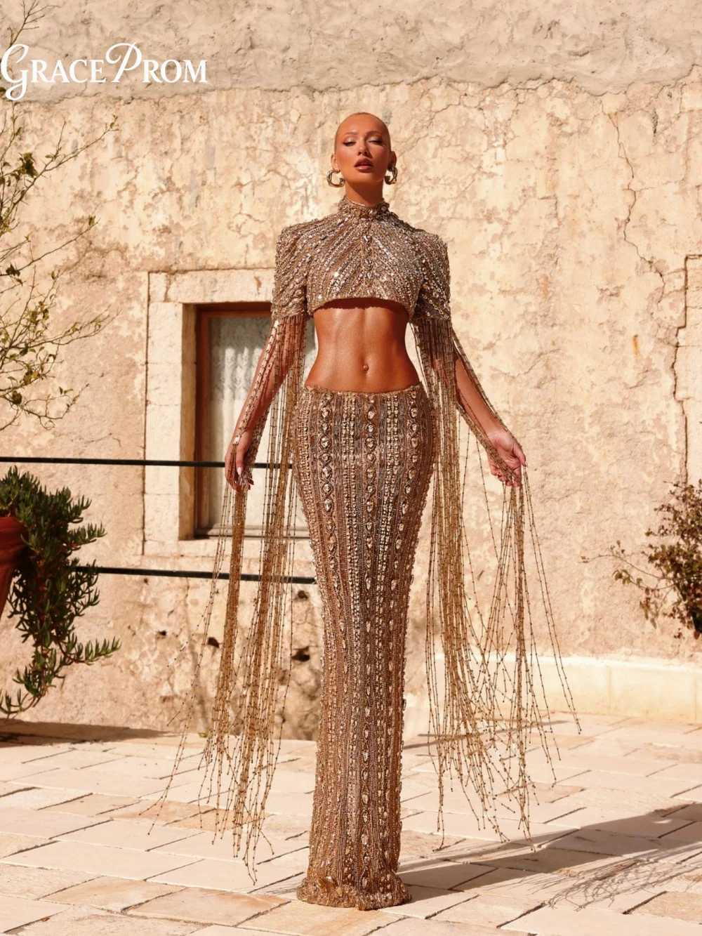 Glamorous Gold Long Dress 2026 Two Piece High Neck Beaded Fringe Sleeves Party Dress Evening Gown For Wedding Guests فساتين سهرة
Glamorous Gold Long Dress 2026 Two Piece High Neck Beaded Fringe Sleeves Party Dress Evening Gown For Wedding Guests فساتين سهرة