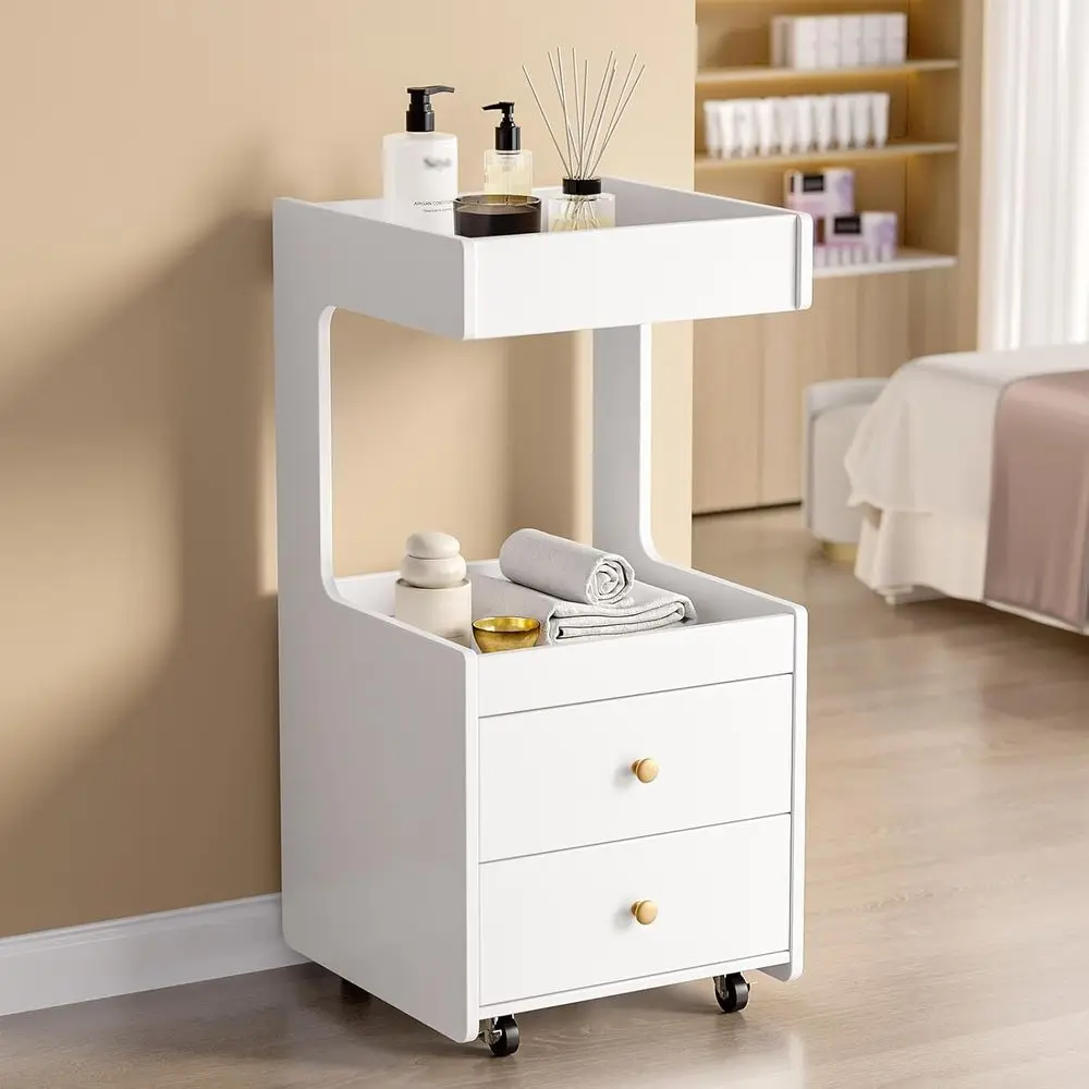 Stylish White Trolley Cart with 2 Drawers, 2 Trays, and Lockable Wheels for Hair Styling and Beauty Spa Use
Stylish White Trolley Cart with 2 Drawers, 2 Trays, and Lockable Wheels for Hair Styling and Beauty Spa Use
