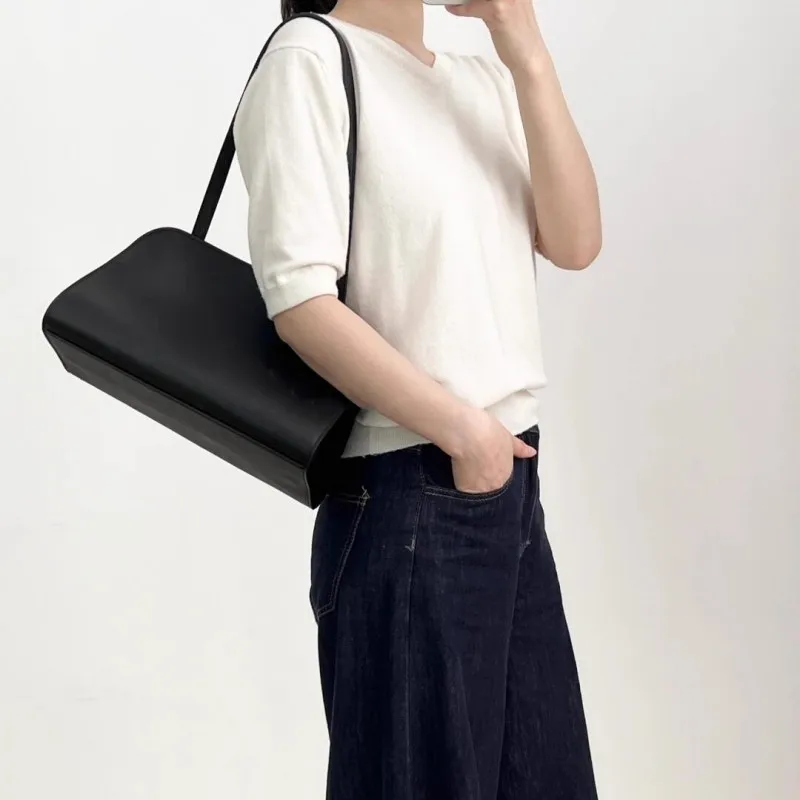 2025 new high-end retro niche women's bag, single-shoulder hand-held underarm bag, simple style
2025 new high-end retro niche women's bag, single-shoulder hand-held underarm bag, simple style