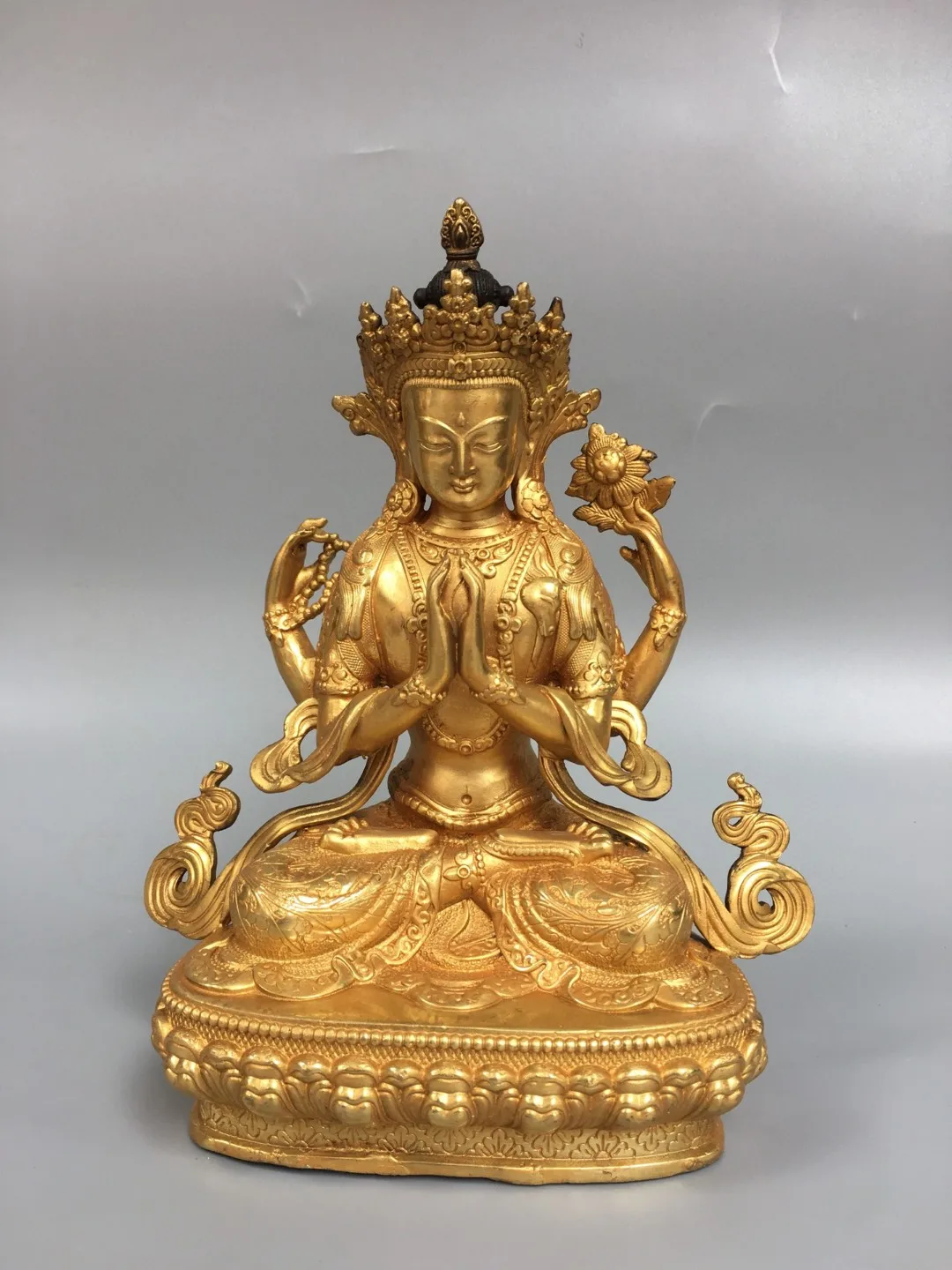 Tibetan Nepalese brass gilt four-arm Guanyin Tara small ornament home Buddhist hall supplies Chinese style 21cm
Tibetan Nepalese brass gilt four-arm Guanyin Tara small ornament home Buddhist hall supplies Chinese style 21cm