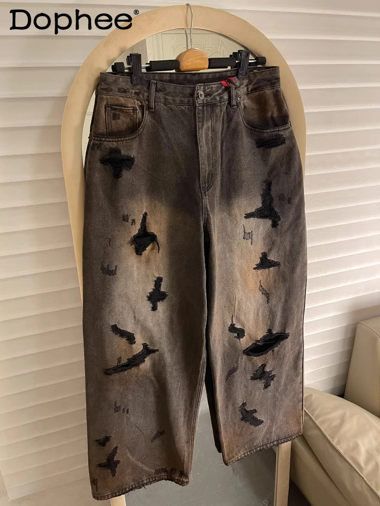 Fashion Hole Design Jeans Men Women 2026 Spring Autumn Loose Trendy Denim Pants Personality High Street Wide Leg Denim Trousers
Fashion Hole Design Jeans Men Women 2026 Spring Autumn Loose Trendy Denim Pants Personality High Street Wide Leg Denim Trousers