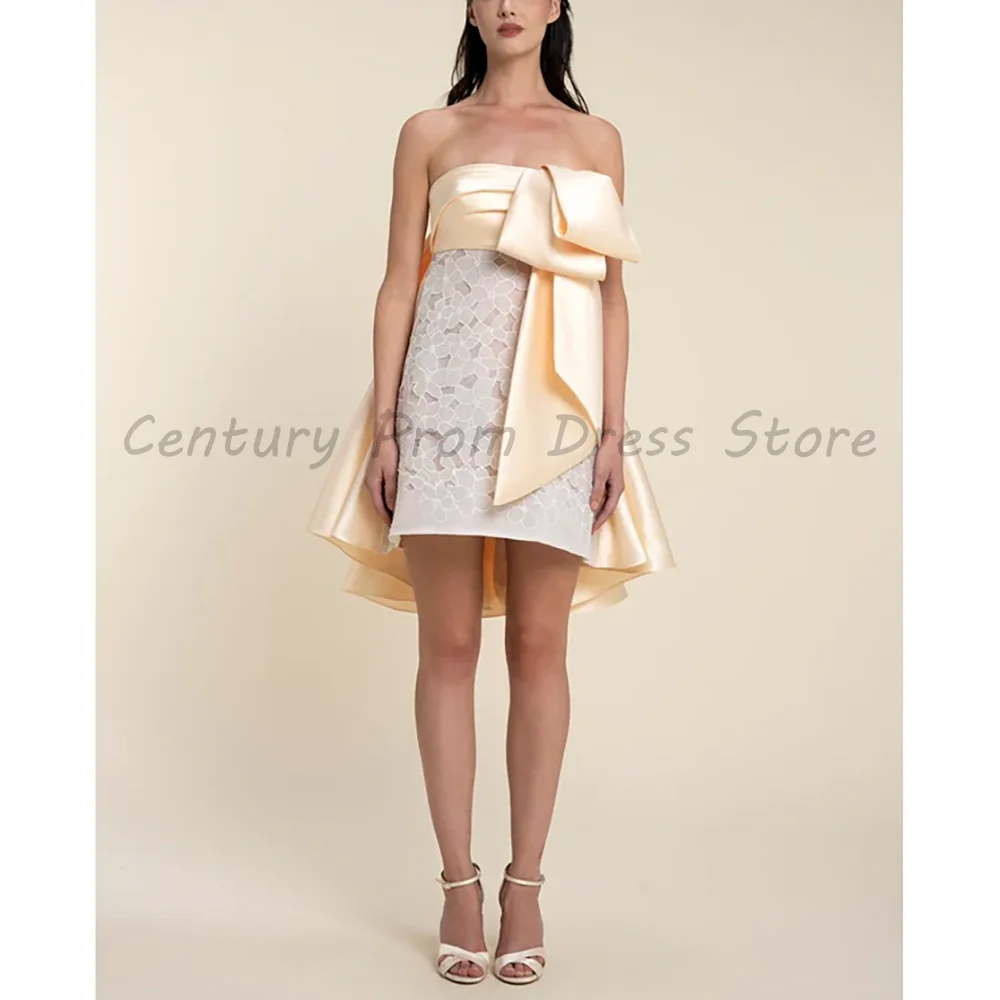 Champagne Strapless Mini Cocktail Dress 2026 Luxury Satin Big Bow Lace A-Line Formal Evening Gown For Women
Champagne Strapless Mini Cocktail Dress 2026 Luxury Satin Big Bow Lace A-Line Formal Evening Gown For Women