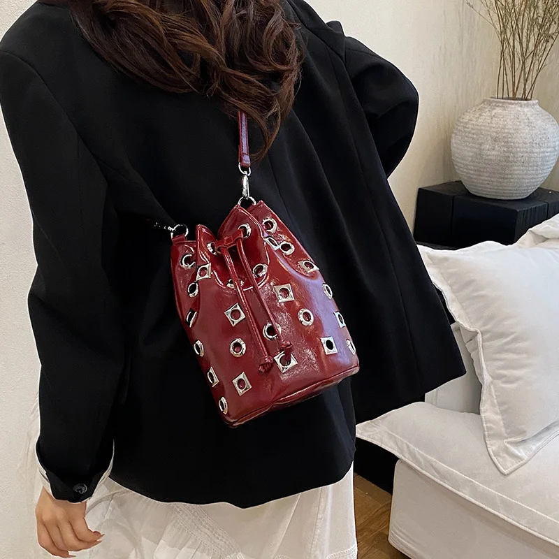 Women's New Rivet Decor Suede Rivet Bucket Bag Punk Style Hollow Out String Design Crossbody Bag Fashion PU Leather Shoulder Bag
Women's New Rivet Decor Suede Rivet Bucket Bag Punk Style Hollow Out String Design Crossbody Bag Fashion PU Leather Shoulder Bag