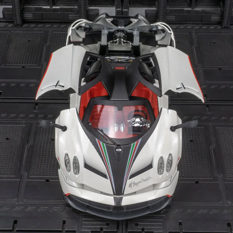 1:24 Pagani loong alloy supercar model car ornaments pull-back steering toy door can be opened.
1:24 Pagani loong alloy supercar model car ornaments pull-back steering toy door can be opened.