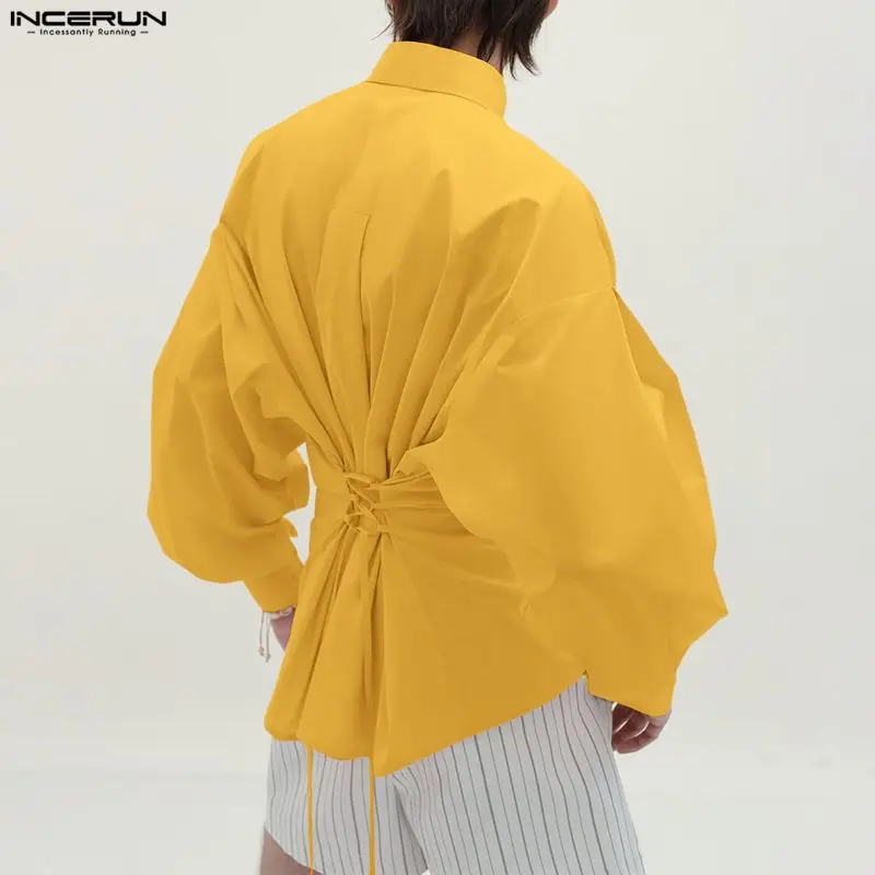 INCERUN Мужская рубашка сплошной цвет с лацканами и длинными рукавами на пуговицах Мужская одежда Уличная одежда со свободной спинкой на шнуровке Модные повседневные топы Camisas
INCERUN Мужская рубашка сплошной цвет с лацканами и длинными рукавами на пуговицах Мужская одежда Уличная одежда со свободной спинкой на шнуровке Модные повседневные топы Camisas