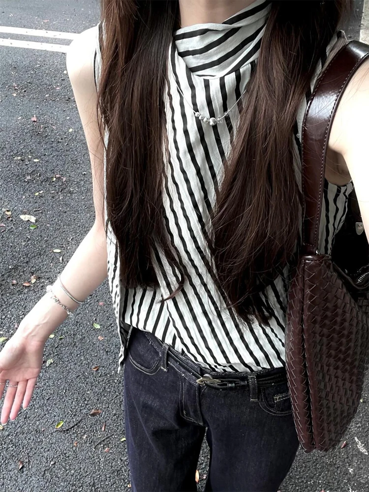 Elegant Striped Sleeveless Shirt for Women Summer Fashion Commute Versatile Unique Bow Detail Shirt Korean Style round Neck S...
Elegant Striped Sleeveless Shirt for Women Summer Fashion Commute Versatile Unique Bow Detail Shirt Korean Style round Neck S...