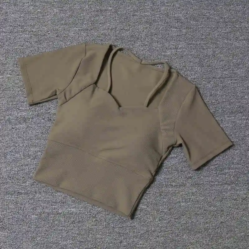 2025 Women New Yoga Gym Sports Cropped Padded T-shirt Short Sleeve Cross Back Casual Fitness Top Wear
2025 Women New Yoga Gym Sports Cropped Padded T-shirt Short Sleeve Cross Back Casual Fitness Top Wear