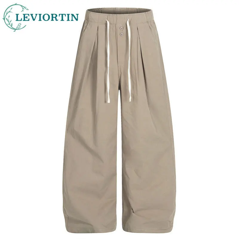 Мужская мода, уличные модные однотонные универсальные свободные широкие брюки, повседневные брюки с эластичной резинкой на талии и ножом
Мужская мода, уличные модные однотонные универсальные свободные широкие брюки, повседневные брюки с эластичной резинкой на талии и ножом