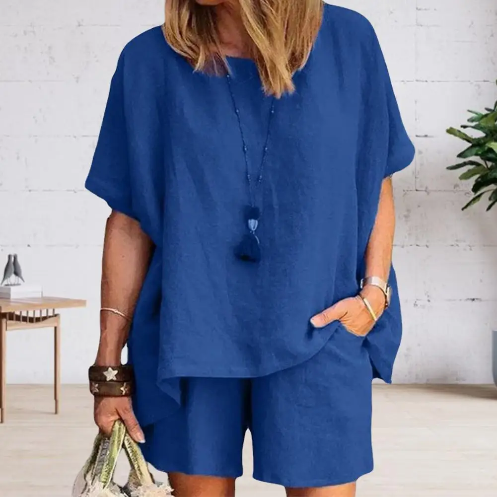 Women's Cotton Linen 2-Piece Outfit Short Sleeve Crewneck Pullover Top And Shorts Set with Pockets Summer Casual Loungewear Trac
Women's Cotton Linen 2-Piece Outfit Short Sleeve Crewneck Pullover Top And Shorts Set with Pockets Summer Casual Loungewear Trac
