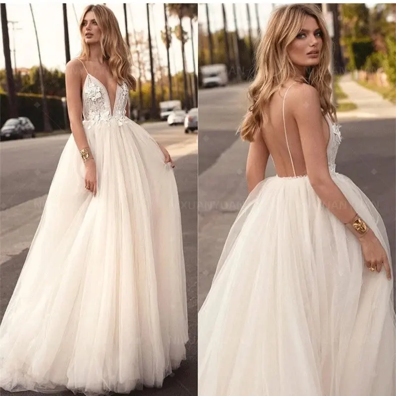 Sexy Deep V-Neck Wedding Dresses Lace Applique Spaghetti Straps Backless Puffy Bridal Gowns A-Line Sleeveless Puffy Beach Gown
Sexy Deep V-Neck Wedding Dresses Lace Applique Spaghetti Straps Backless Puffy Bridal Gowns A-Line Sleeveless Puffy Beach Gown