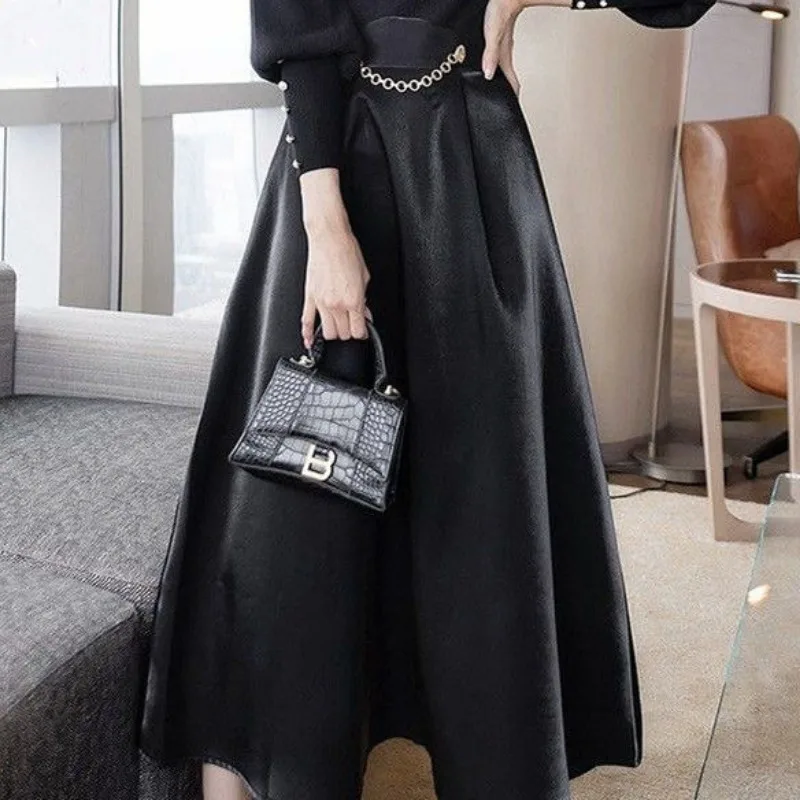 Осенне-зимняя элегантная юбка, длинная юбка, юбка трапециевидной формы, с высокой талией, большая распашная юбка-зонтик, глянцевая юбка средней длины
Осенне-зимняя элегантная юбка, длинная юбка, юбка трапециевидной формы, с высокой талией, большая распашная юбка-зонтик, глянцевая юбка средней длины