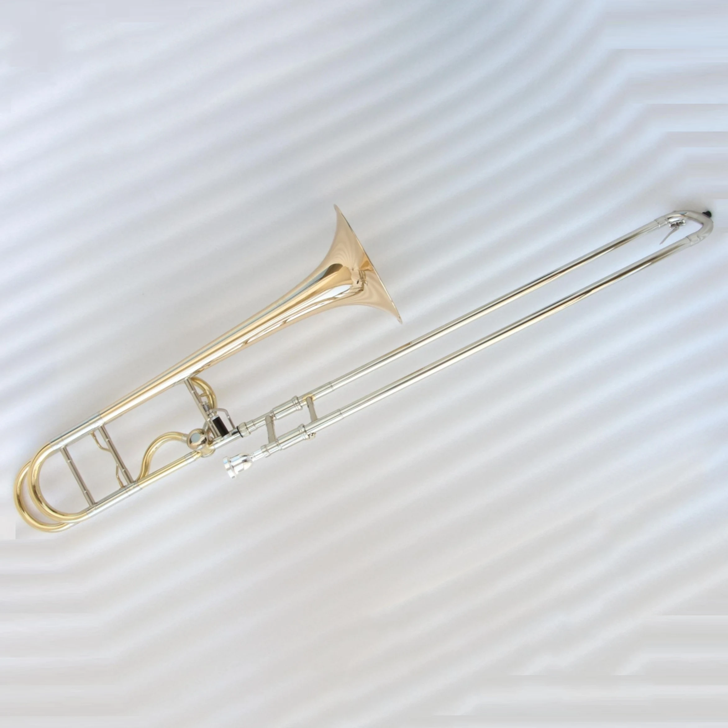 Professional Instrument Brass Material Band Professional Grade Examination Playing Bb/F Clear Lacquered Tenor Trombone for Sale
Professional Instrument Brass Material Band Professional Grade Examination Playing Bb/F Clear Lacquered Tenor Trombone for Sale