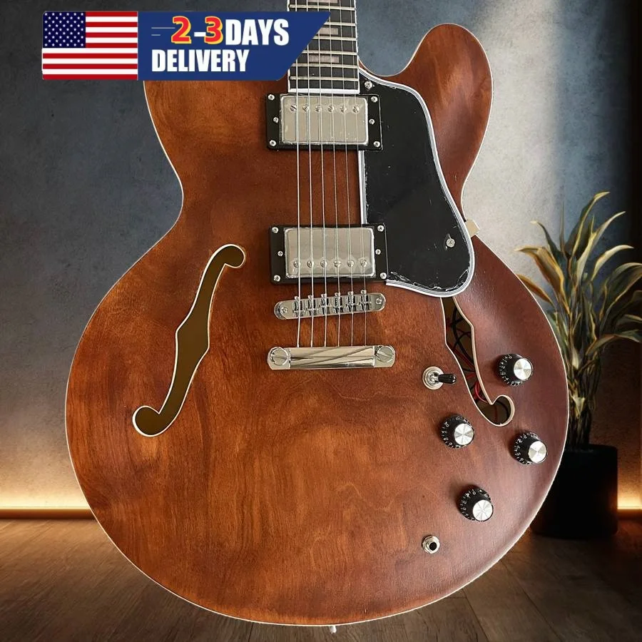 New brown electric guitar with black guard plate, 6-series fixed bridge, quality assurance
New brown electric guitar with black guard plate, 6-series fixed bridge, quality assurance