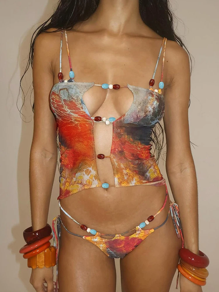 Винтажный сетчатый сексуальный комплект из трех предметов, купальник для женщин, лето 2025 года, бандажный бикини на шнуровке с прикрытой юбкой, пляжная одежда
Винтажный сетчатый сексуальный комплект из трех предметов, купальник для женщин, лето 2025 года, бандажный бикини на шнуровке с прикрытой юбкой, пляжная одежда