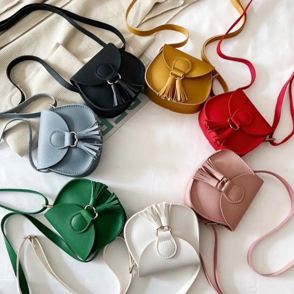 Korean Style Hook Design Mini Kids Bag PU Leather Solid Color Shoulder Sling Bag Tassels Crossbody Bag Children Girls
Korean Style Hook Design Mini Kids Bag PU Leather Solid Color Shoulder Sling Bag Tassels Crossbody Bag Children Girls
