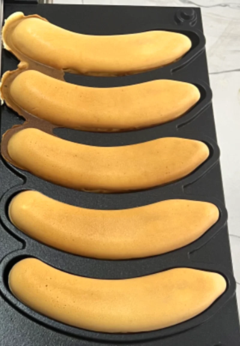 Новое поступление, 5 шт., машина для вафель в форме банана, электрическая 110 В 220 В, антипригарная нержавеющая сталь, банановый торт, вафельница Тайяки
Новое поступление, 5 шт., машина для вафель в форме банана, электрическая 110 В 220 В, антипригарная нержавеющая сталь, банановый торт, вафельница Тайяки