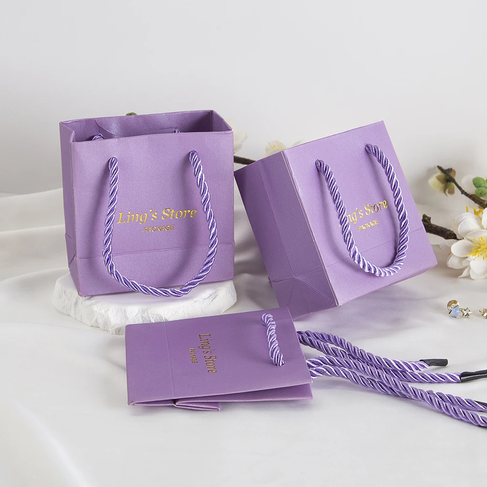 20/50/100Pcs Personalized Print Logo Violet Jewelry Paper Tote Handle Bags Bracelet Rings Cosmetic Shopping Small Gift Packaging
20/50/100Pcs Personalized Print Logo Violet Jewelry Paper Tote Handle Bags Bracelet Rings Cosmetic Shopping Small Gift Packaging
