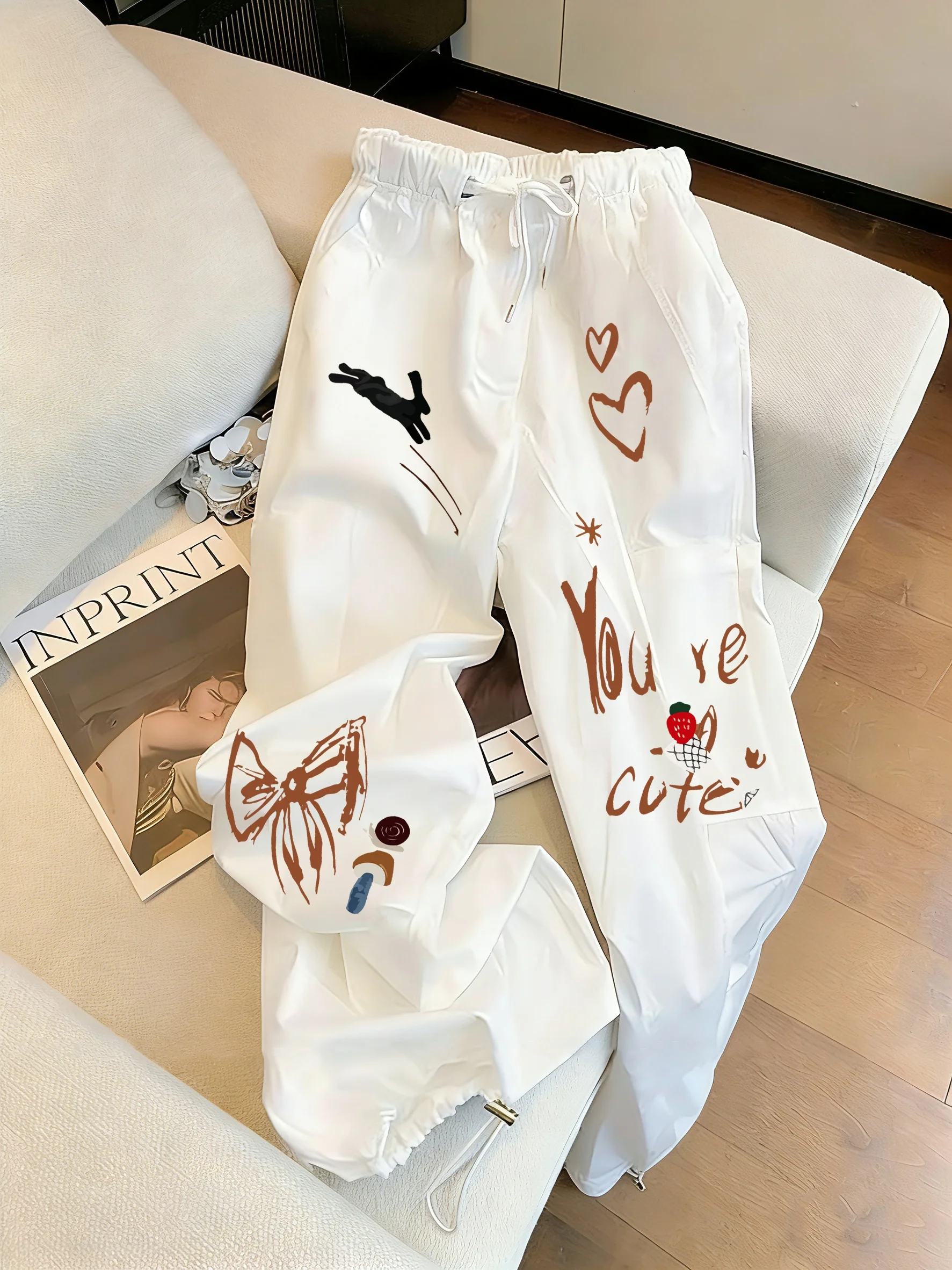 Fashionable Sporty Cartoon Print Drawstring Casual Pants Loose Wide Leg Trousers for Men And Women Summer Trendy Loose Fit
Fashionable Sporty Cartoon Print Drawstring Casual Pants Loose Wide Leg Trousers for Men And Women Summer Trendy Loose Fit