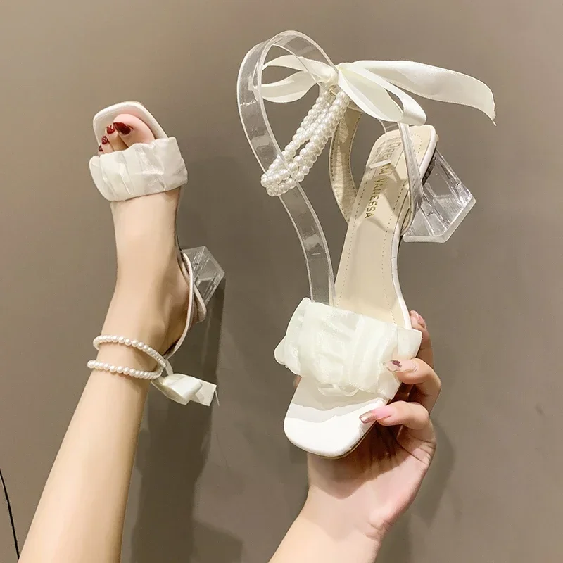 Fairy Style Square Toe Lace String Bead Wedding Shoes Transparent High Heels Elegant Women Summer High Heeled Sandals
Fairy Style Square Toe Lace String Bead Wedding Shoes Transparent High Heels Elegant Women Summer High Heeled Sandals