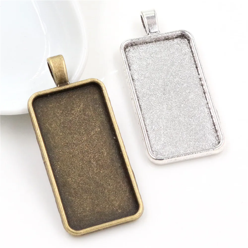 New Fashion 5pcs 19x38mm Inner Size 2 Colors rectangle Cabochon Base Setting Charms Pendant,Fit 19*38mm Square Glass Cabochons
New Fashion 5pcs 19x38mm Inner Size 2 Colors rectangle Cabochon Base Setting Charms Pendant,Fit 19*38mm Square Glass Cabochons