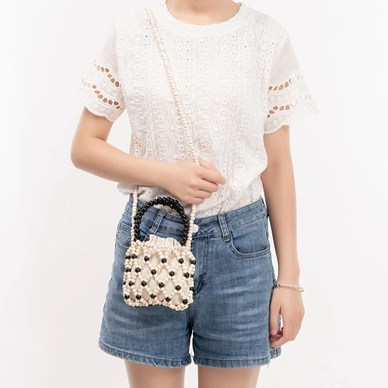 Women's Hollow-Out Beaded Shoulder Bag Handmade Woven Wooden Bead Phone Purse Small Square Summer Daily
Women's Hollow-Out Beaded Shoulder Bag Handmade Woven Wooden Bead Phone Purse Small Square Summer Daily
